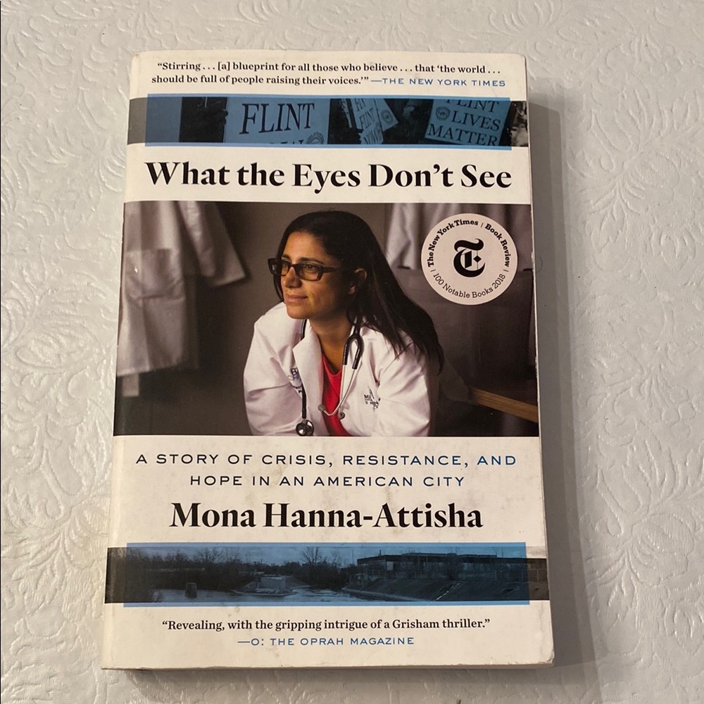 What The Eyes Don’t See: A Story Of Crisis, Resistance, And Hope . . Book